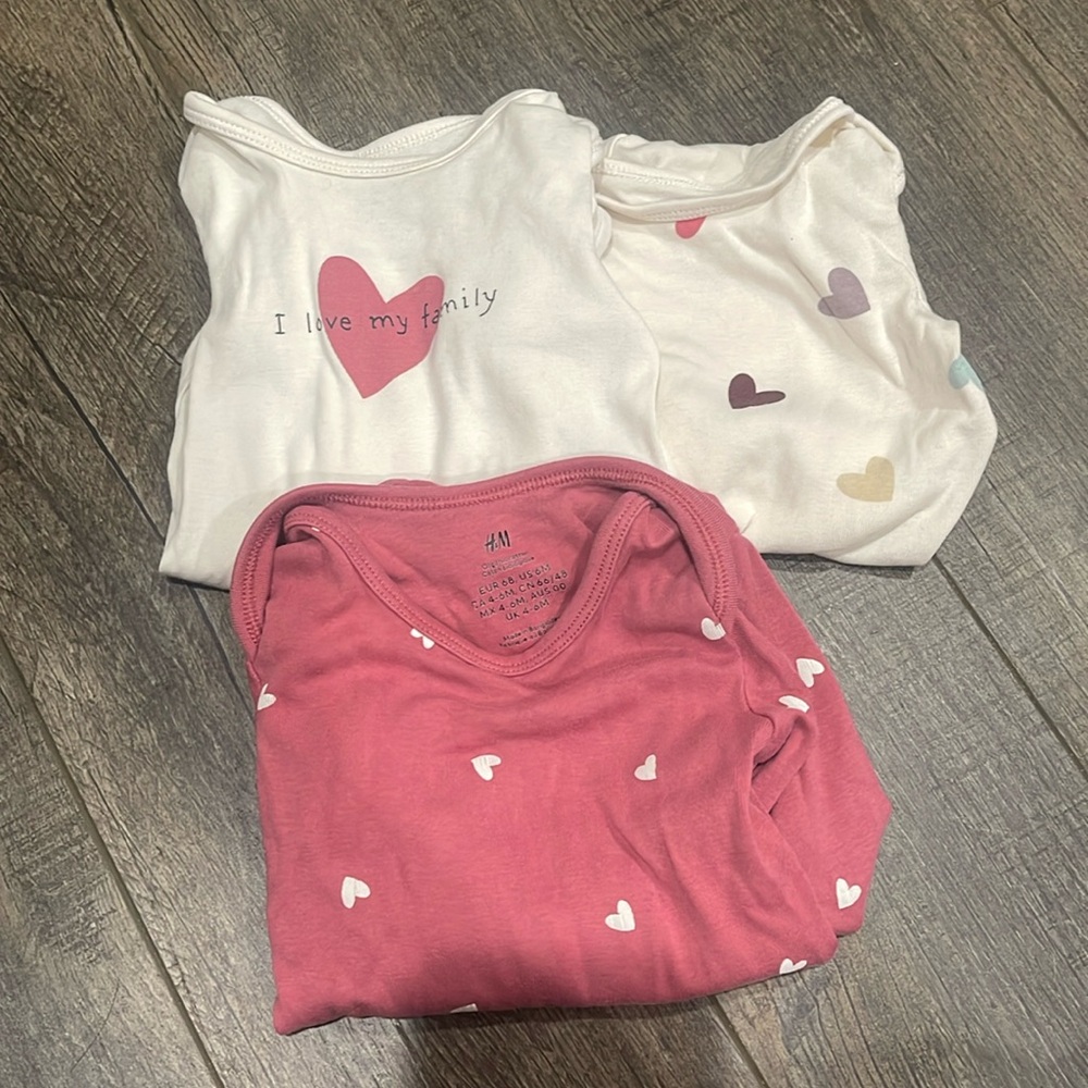 Lone sleeve onesie